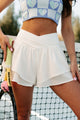 Photo Finish Cross-Waist Tiered Active Shorts (White) - NanaMacs