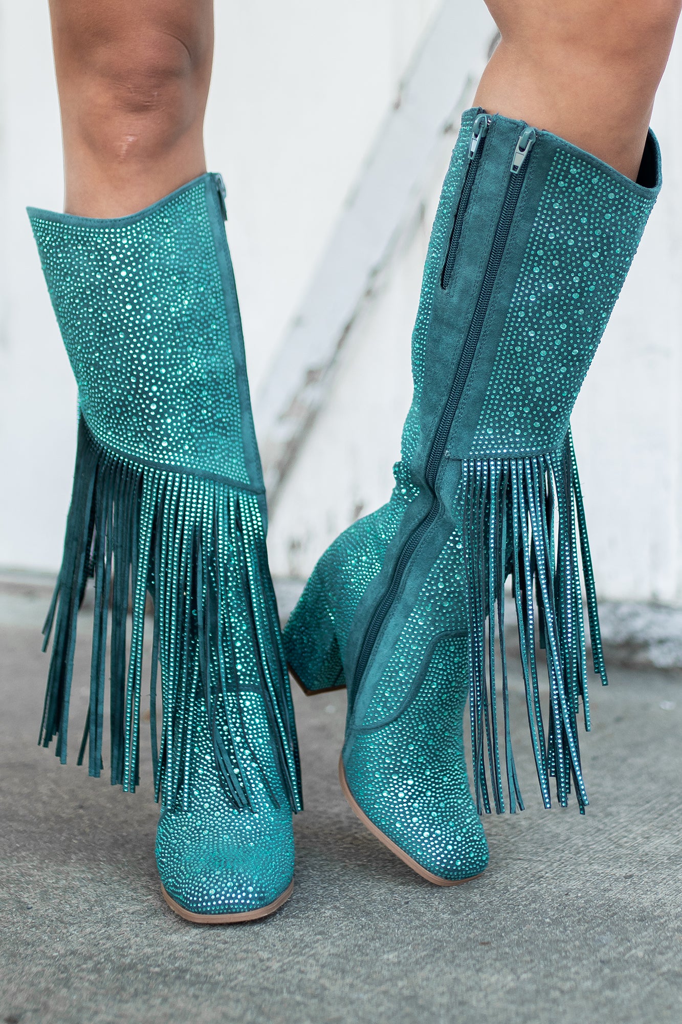 Teal fringe clearance boots