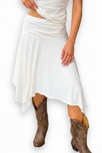 Woman in white flowy skirt