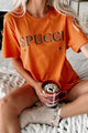 "Spucci" Graphic T-Shirt (Orange) - Print On Demand - NanaMacs