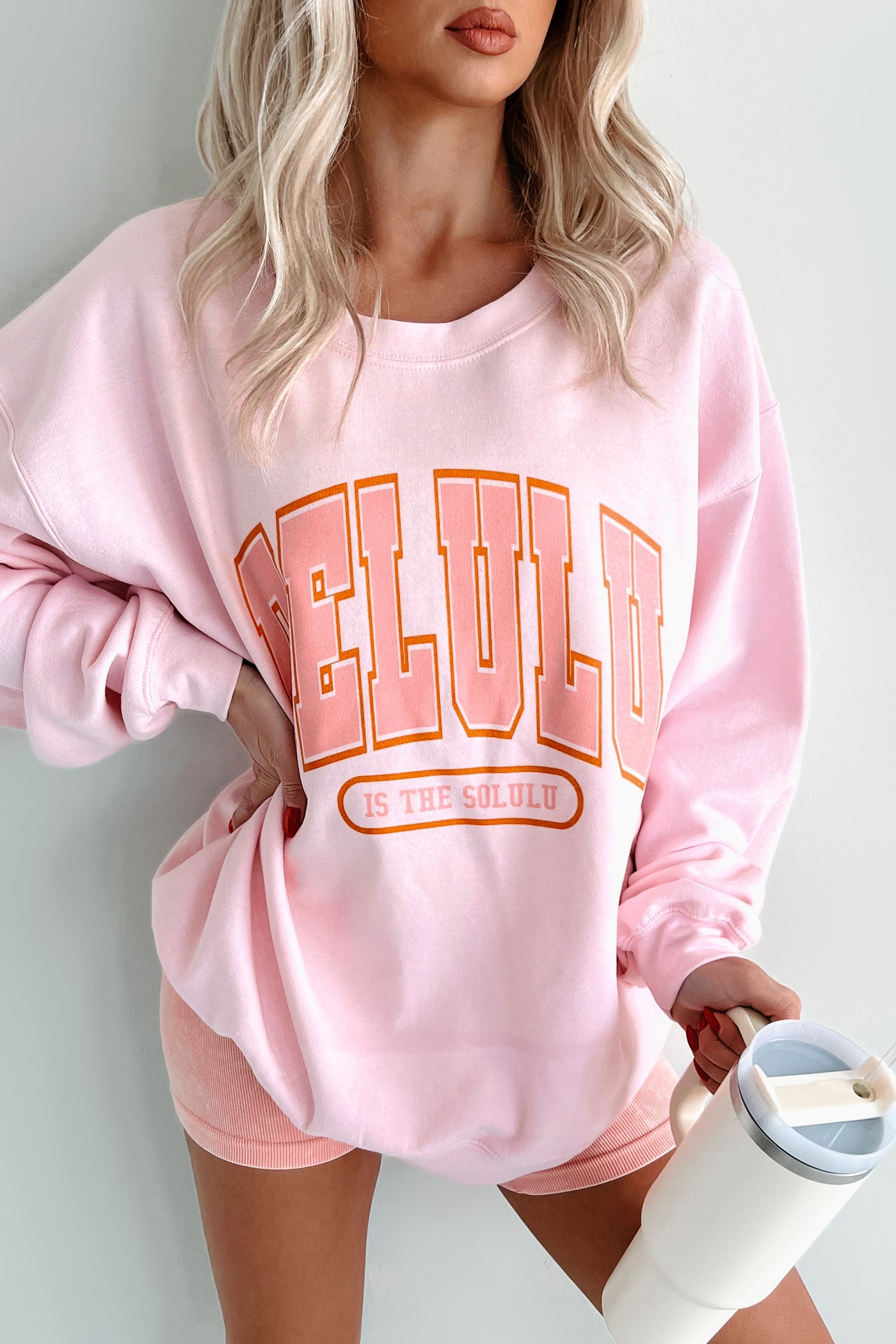 "Delulu Is The Solulu" Graphic Sweatshirt (Light Pink) - NanaMacs