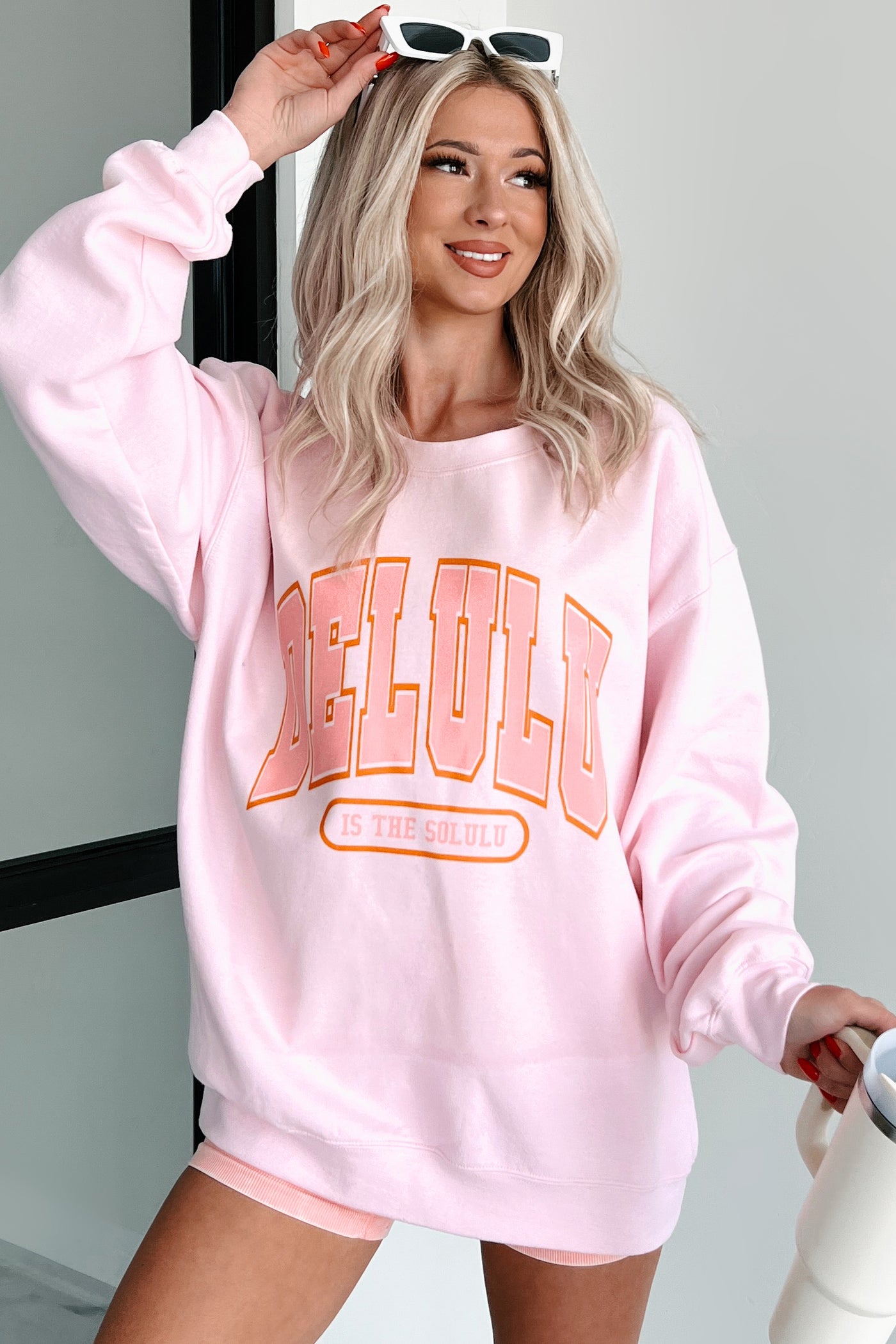 "Delulu Is The Solulu" Graphic Sweatshirt (Light Pink) - NanaMacs