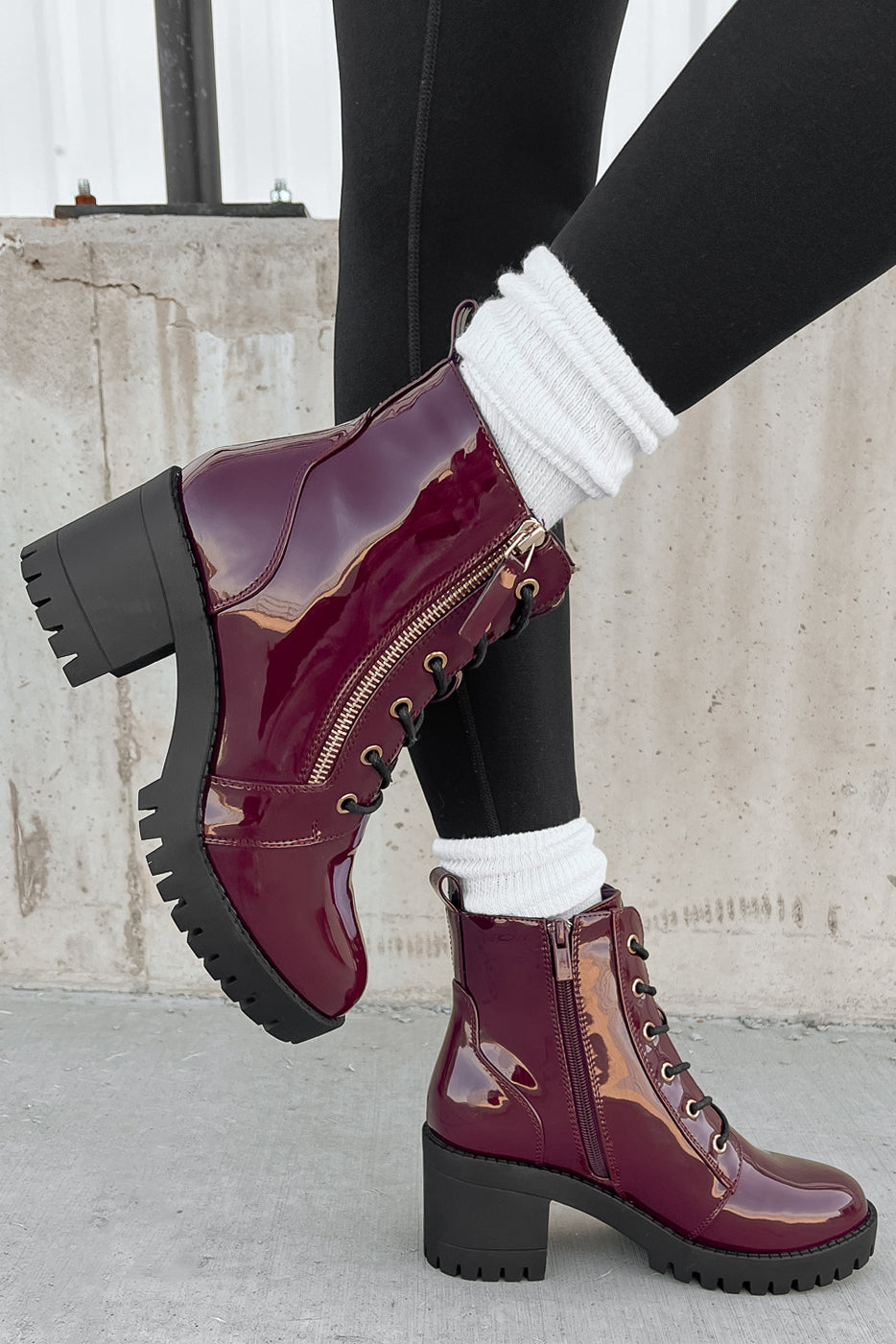 Tougher Than You Lug Sole Patent Leather Combat Booties Wine