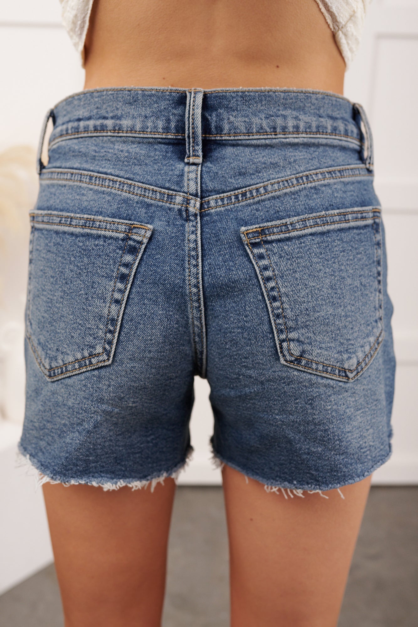 Colten Distressed High-Low Jean Shorts (Medium Denim) - NanaMacs