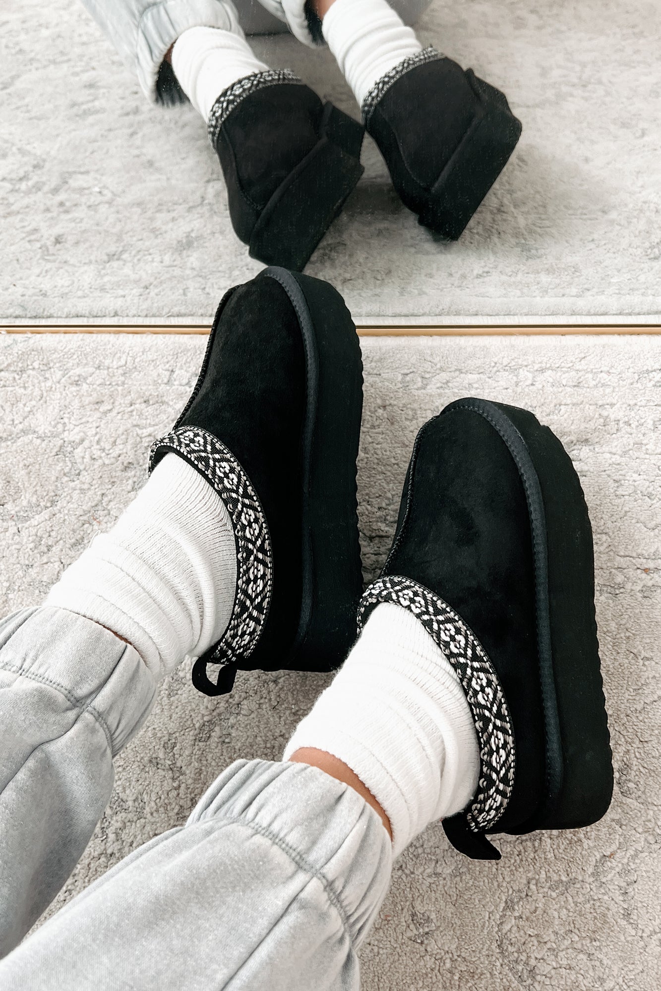 Black shops faux fur lined slip on plimsolls