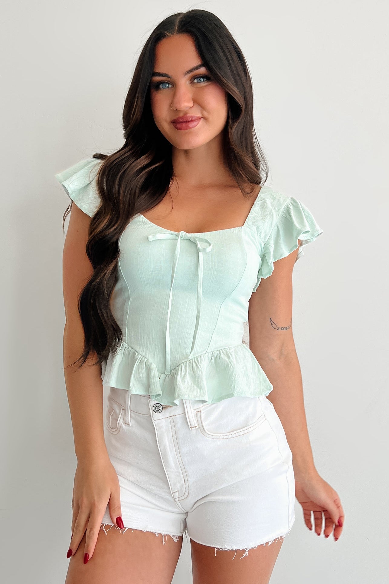 green peplum top