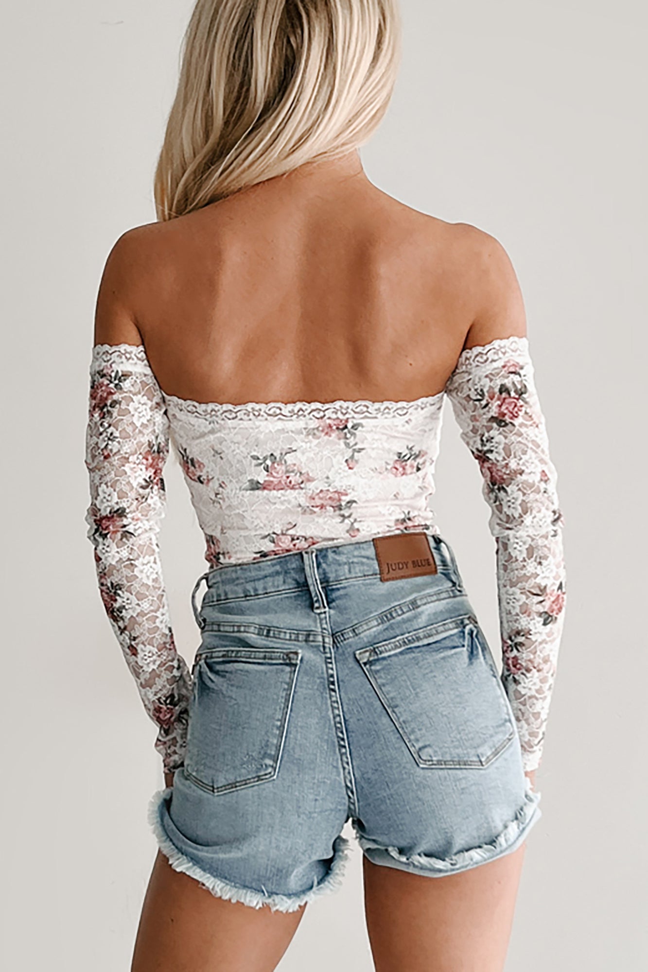 Radiating Grace Off Shoulder Floral Lace Bodysuit (White/Pink)