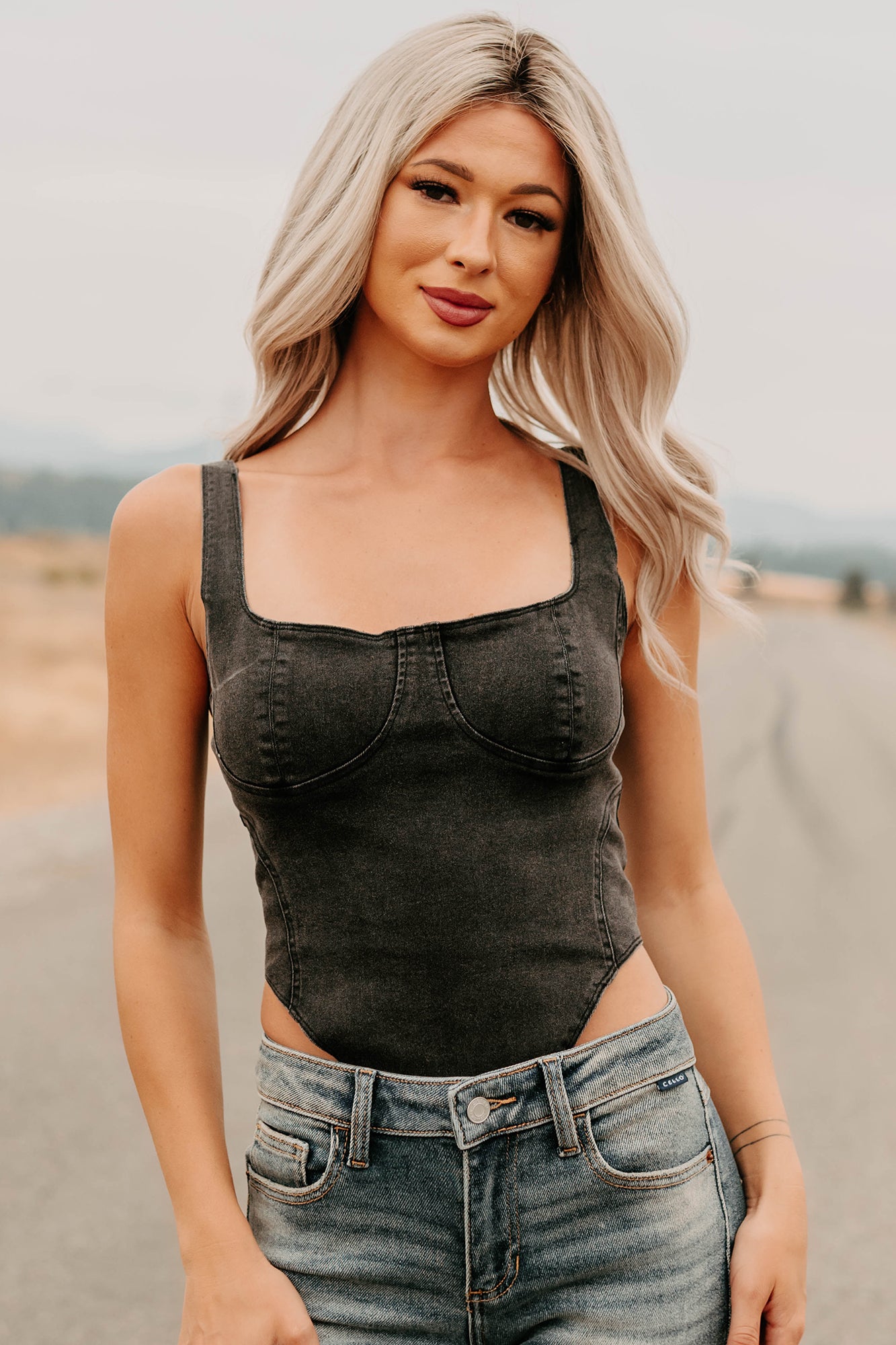Fueled By Confidence Signature 8 Stretchy Denim Bodysuit (Washed