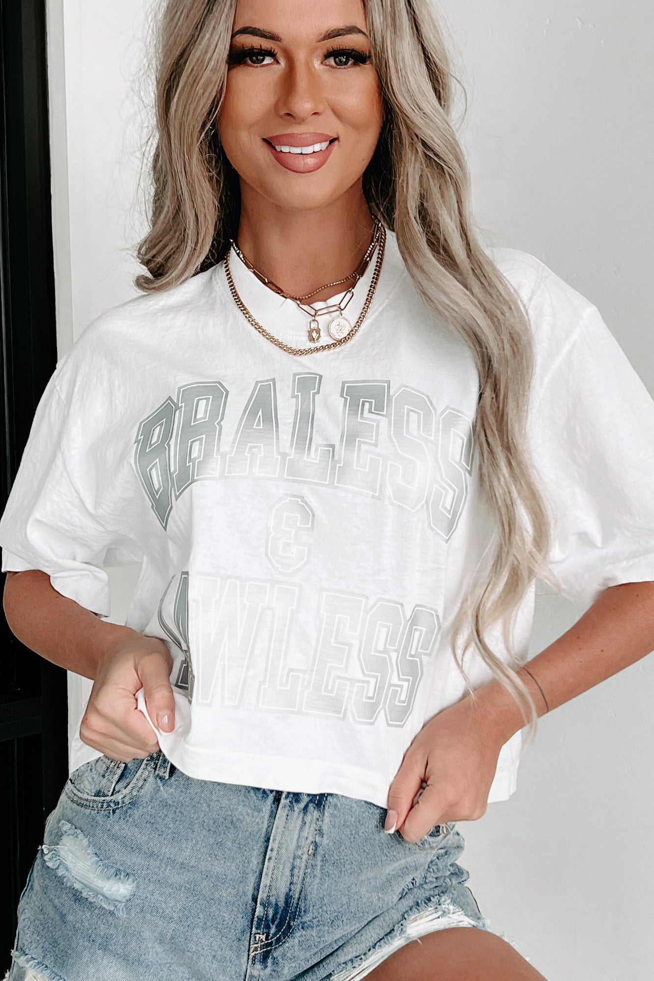 "Braless & Lawless" Oversized Crop Tee With Metallic Graphic (White) - Print On Demand - NanaMacs