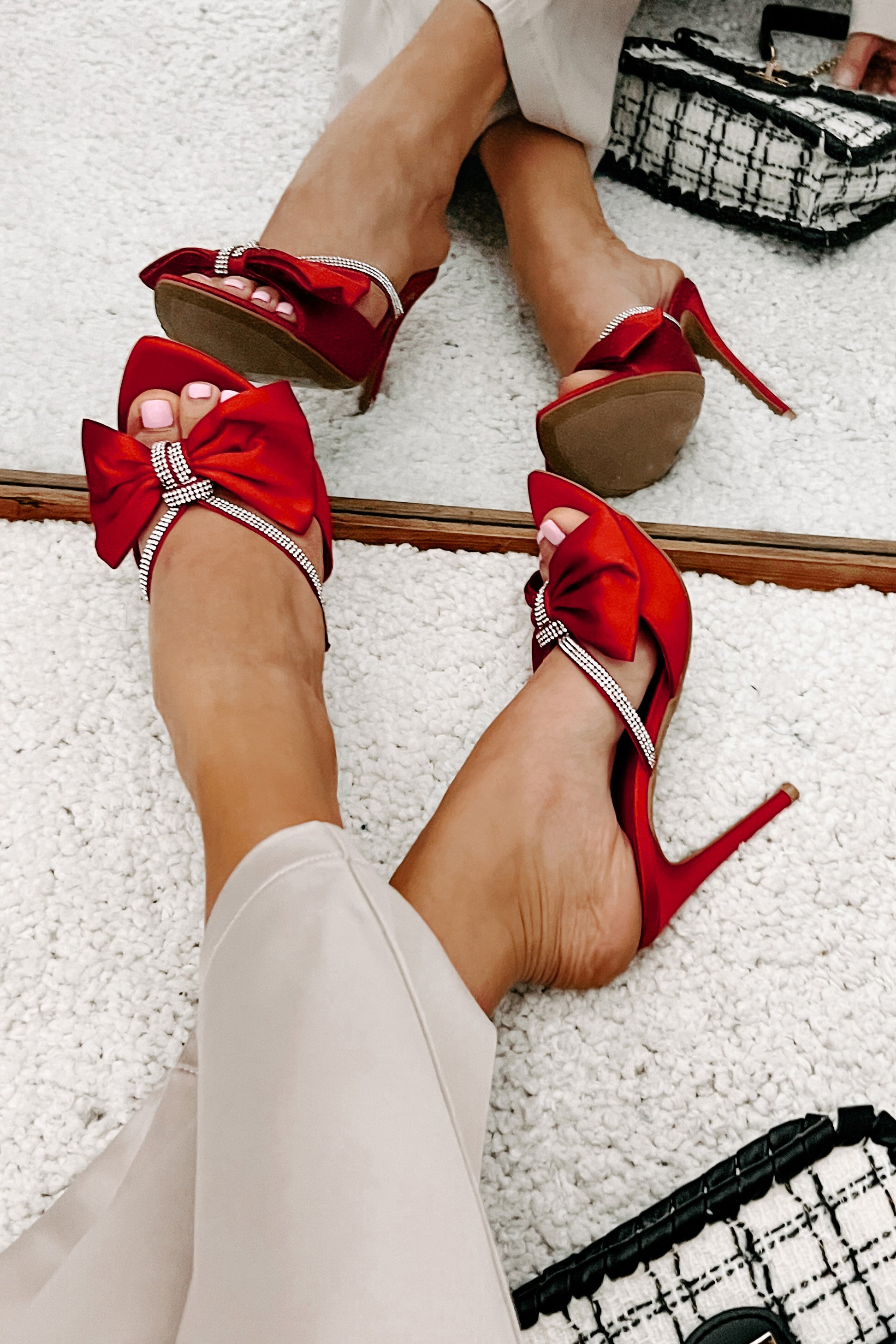 Red heels with deals bow