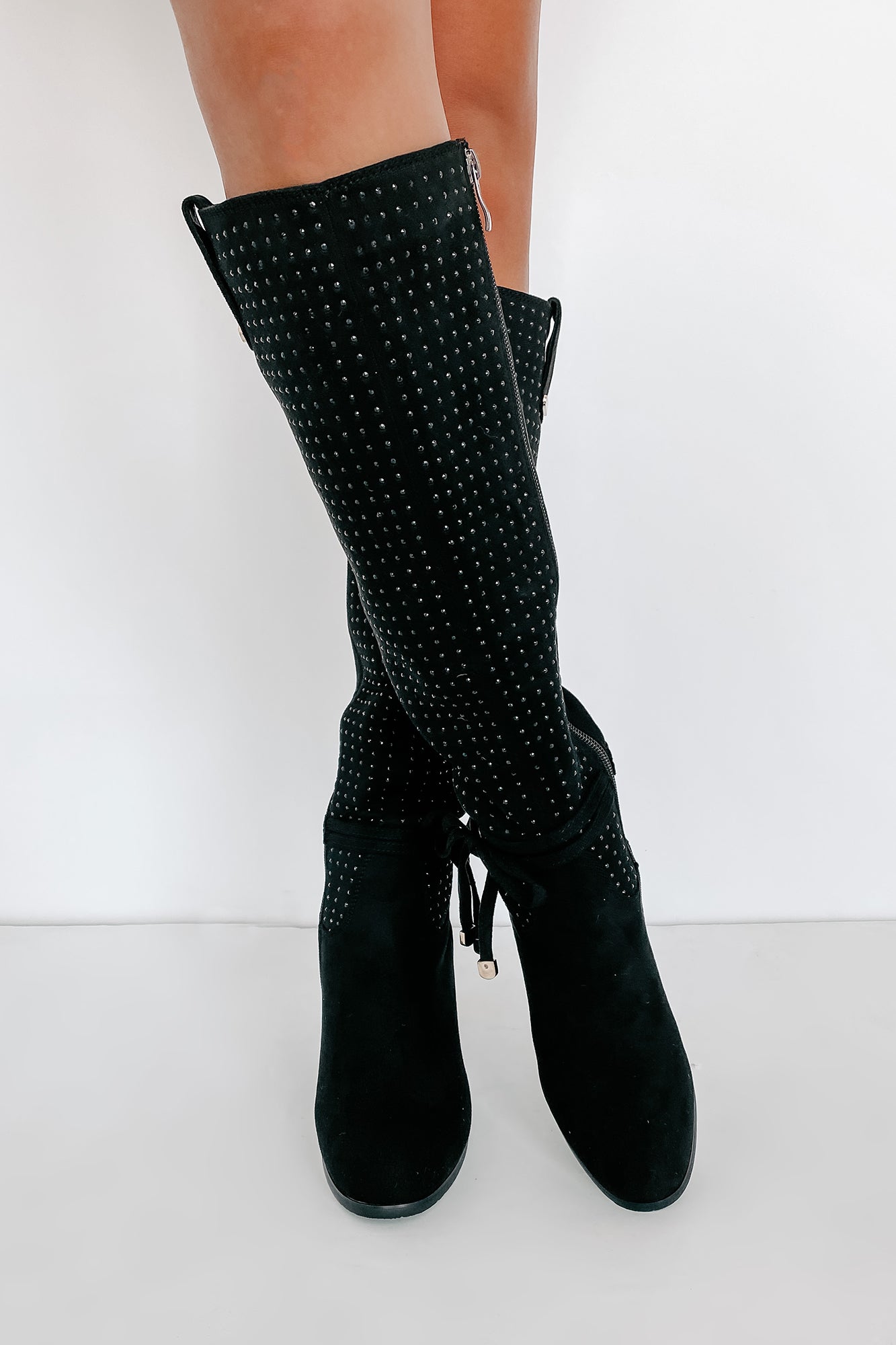 Knee high clearance boots with strings