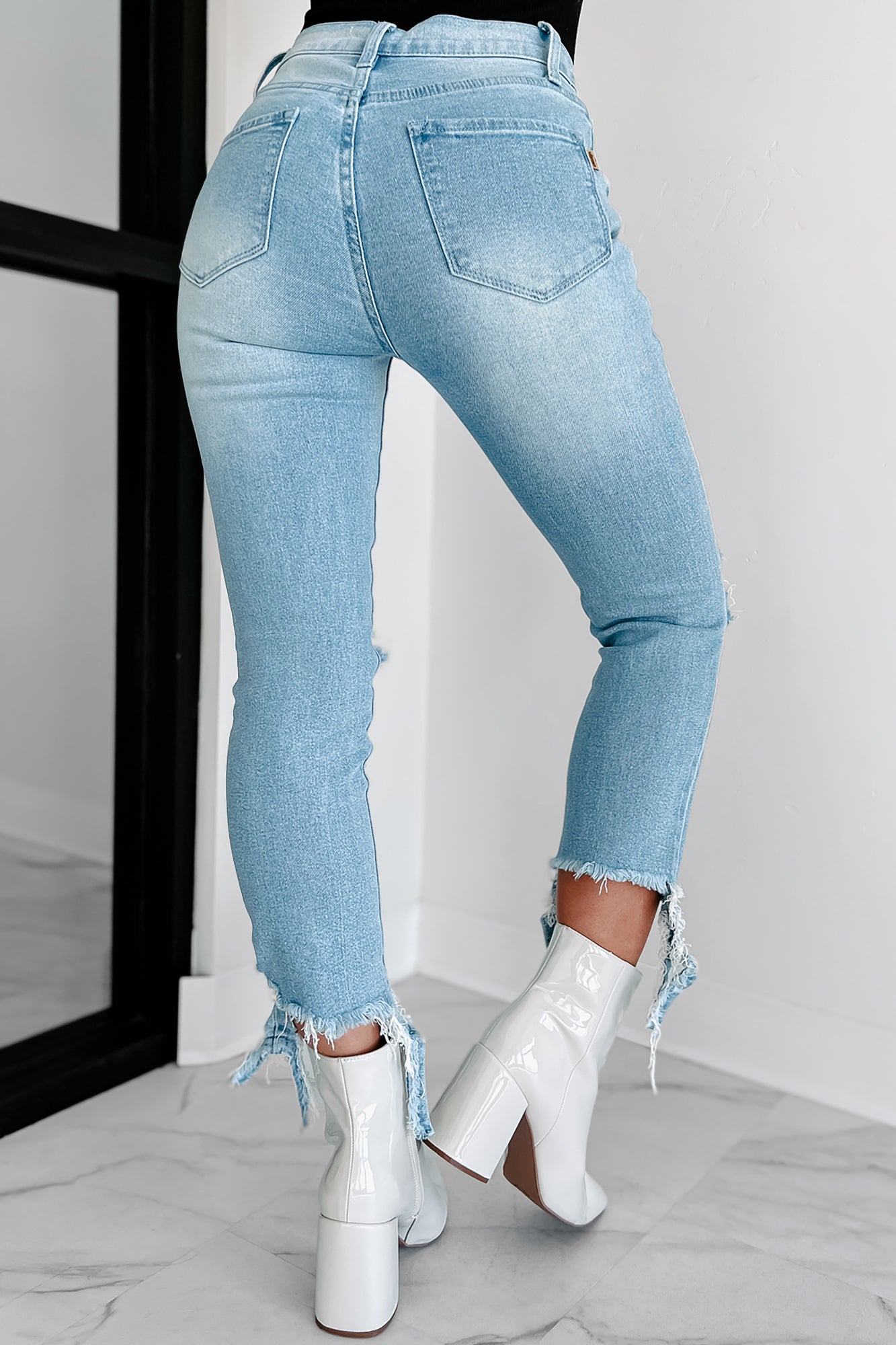 Mid Rise Cropped Skinny with a Frayed & Distressed Hem Jeans in