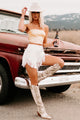 Can I Get A Yee-Haw Fringe Trim Faux Leather Shorts (White) - NanaMacs